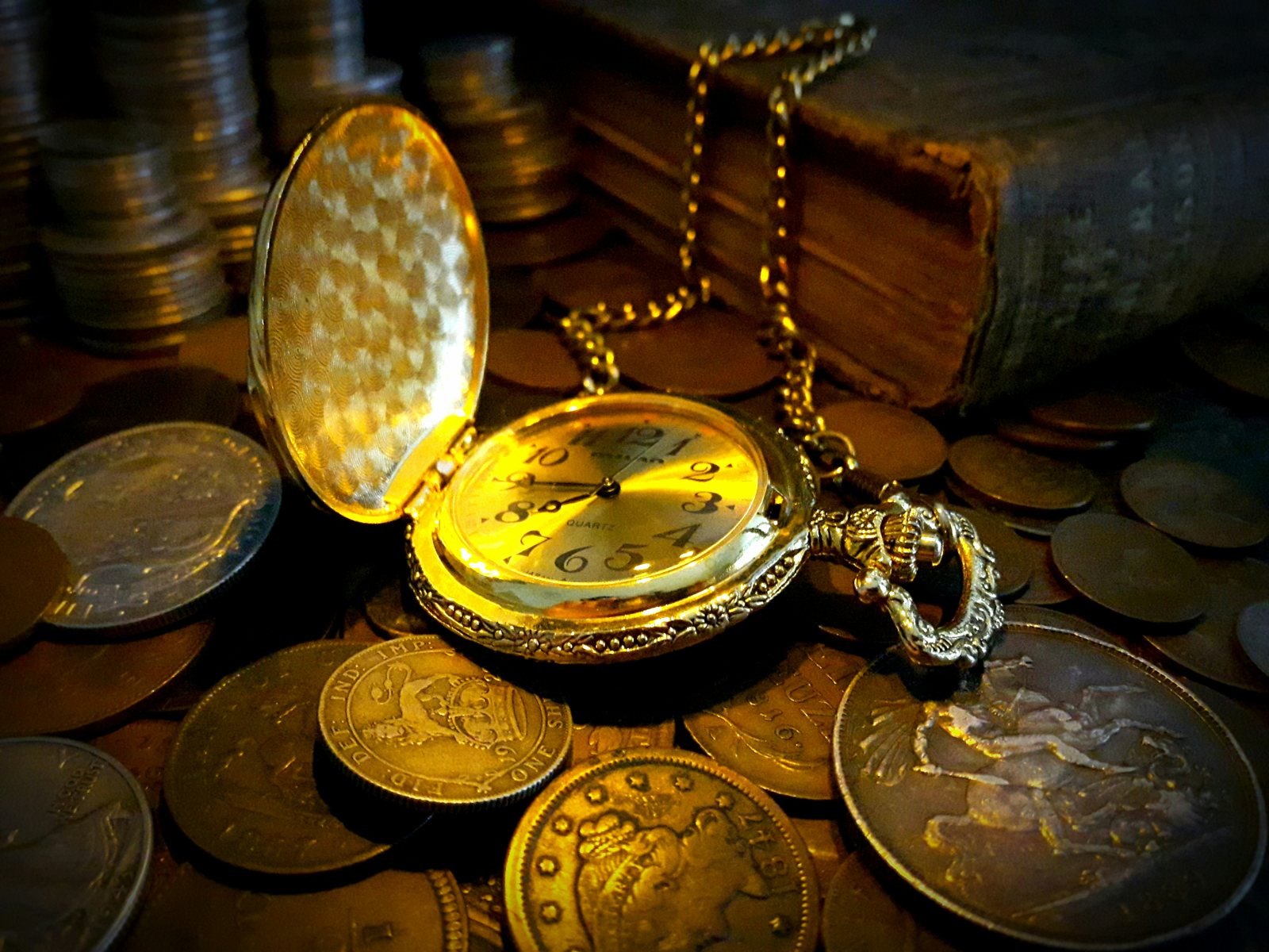 Antique pocket watch and collectible coins